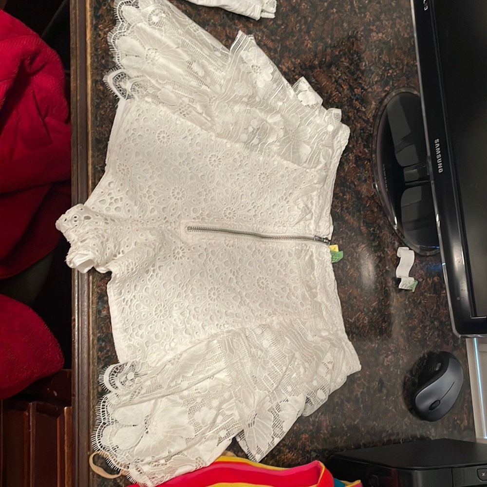 Size M- worn once- lace is in tact- good condition